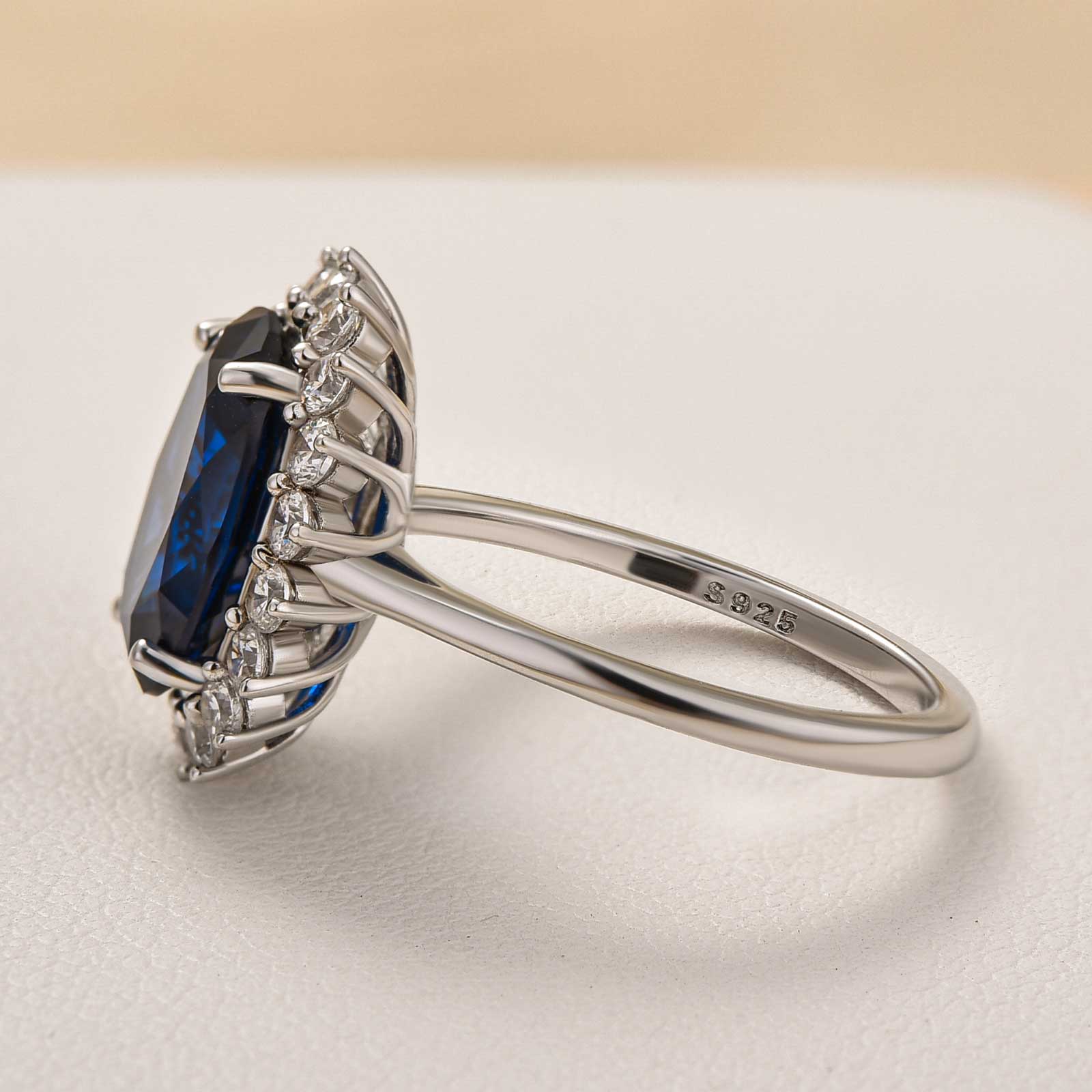Luxurious Halo Oval Cut Blue Sapphire Engagement Ring In Sterling Silver