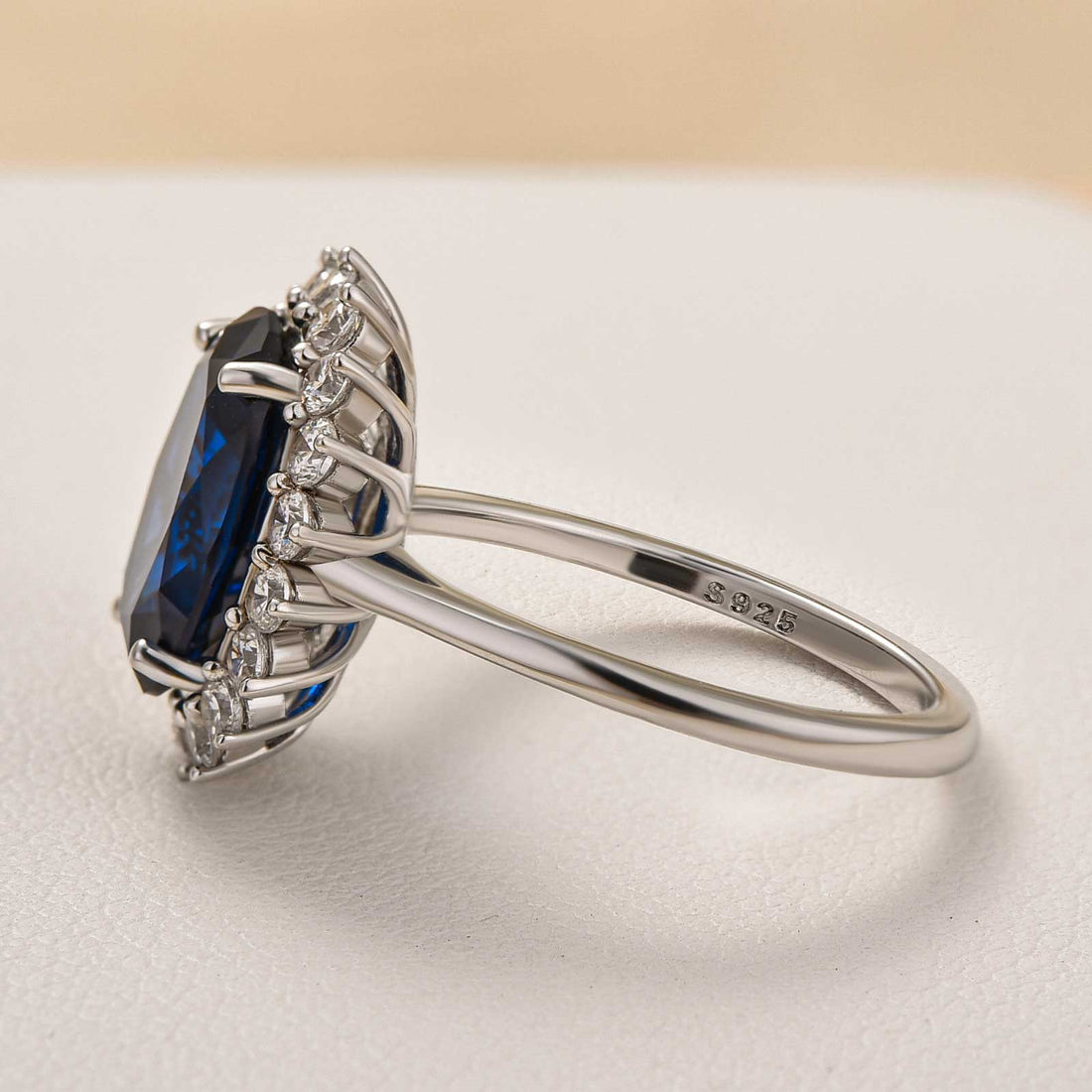 Luxurious Halo Oval Cut Blue Sapphire Engagement Ring In Sterling Silver