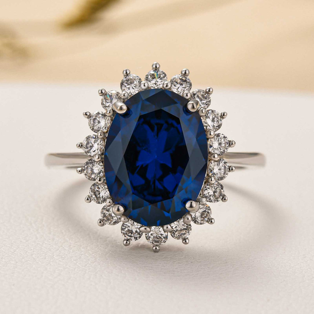 Luxurious Halo Oval Cut Blue Sapphire Engagement Ring In Sterling Silver